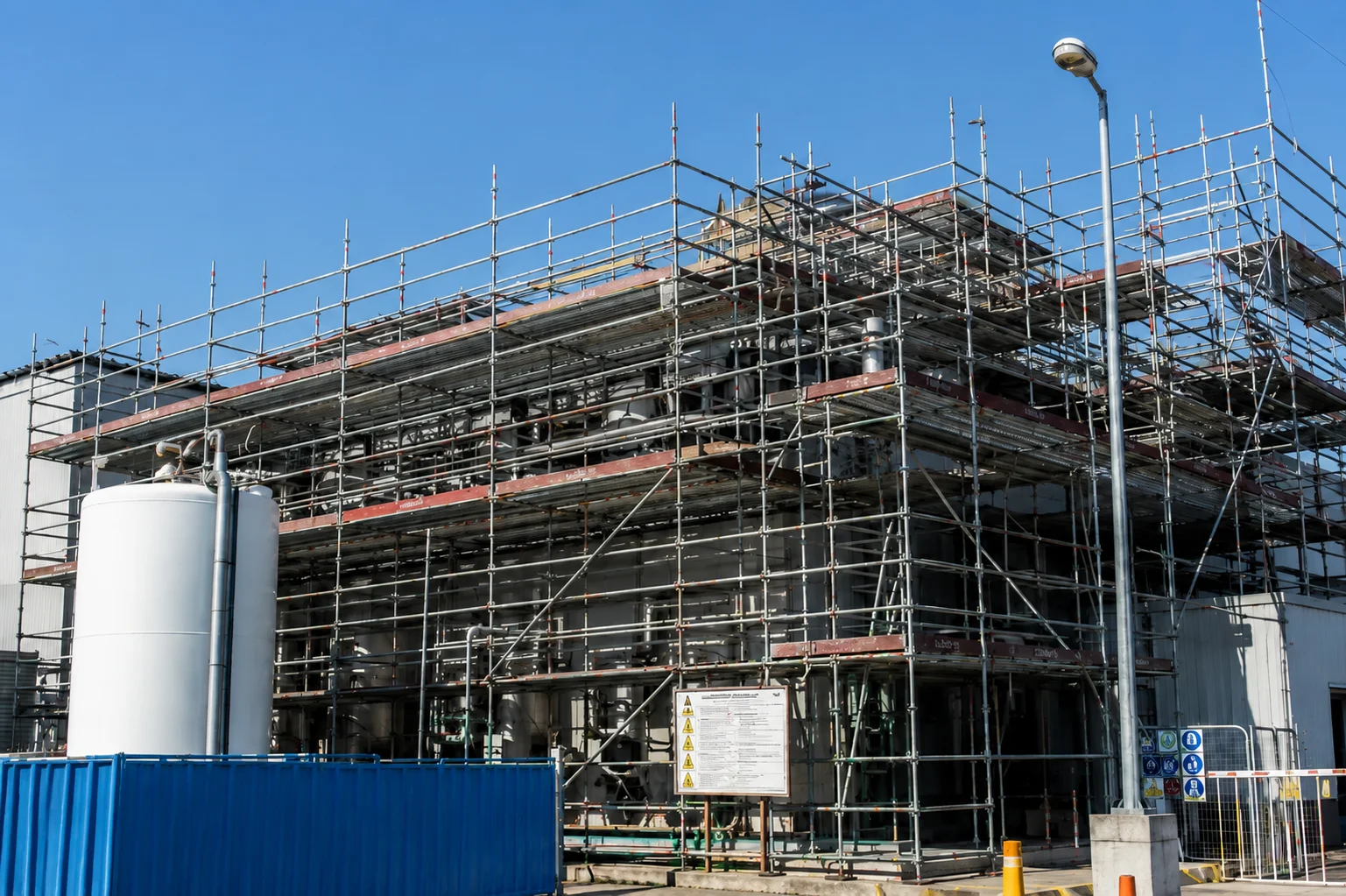 Heavy-duty Layher modular system scaffolding installed by Ainscaff engineers at a commercial industrial pharmaceutical facility in Ringaskiddy, Cork.